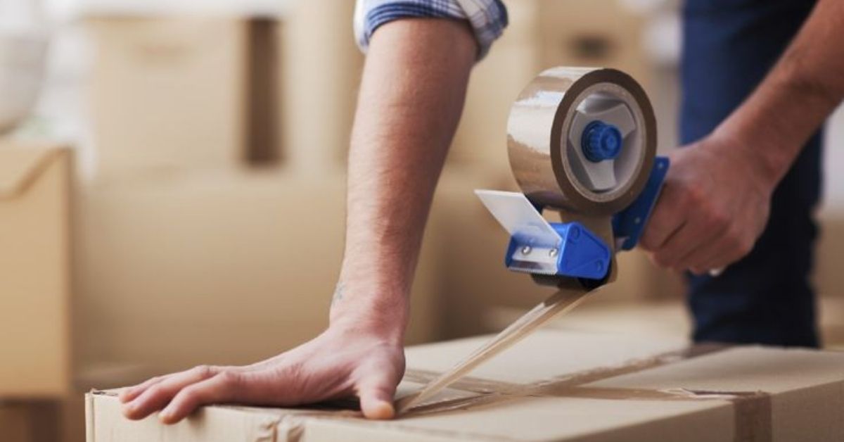 Sealing a box with tape
